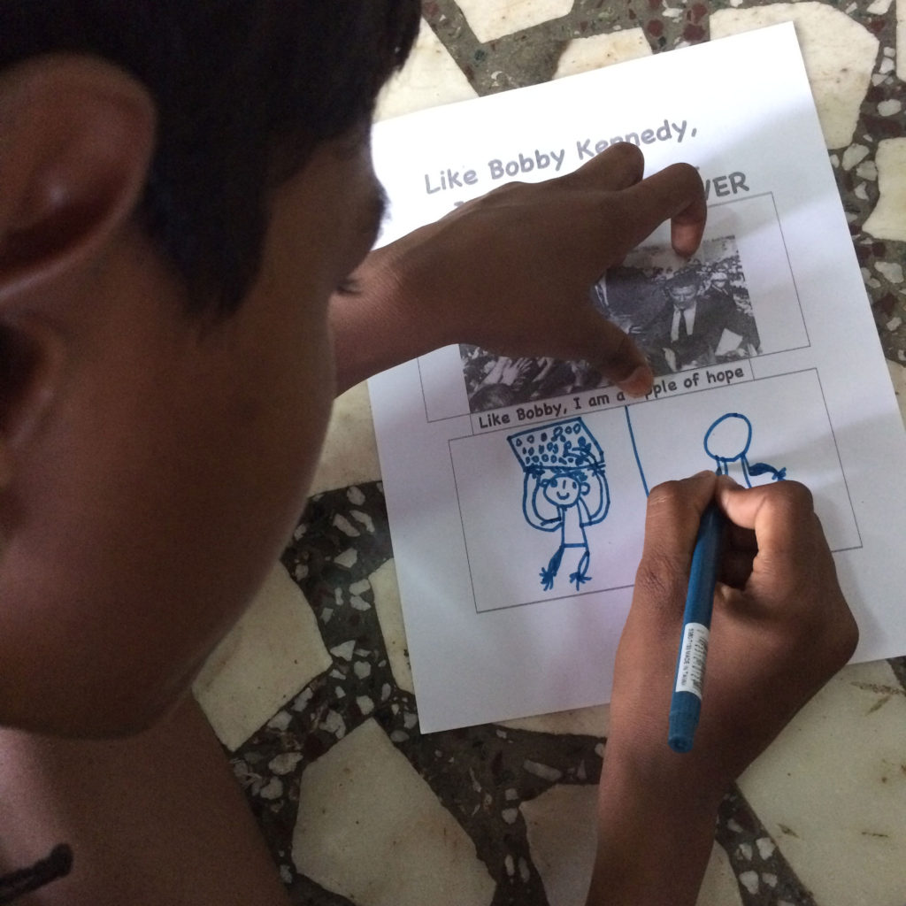 A child drawing on a piece of paper